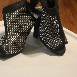 Peep Toe heeled sling Back ankle boots.